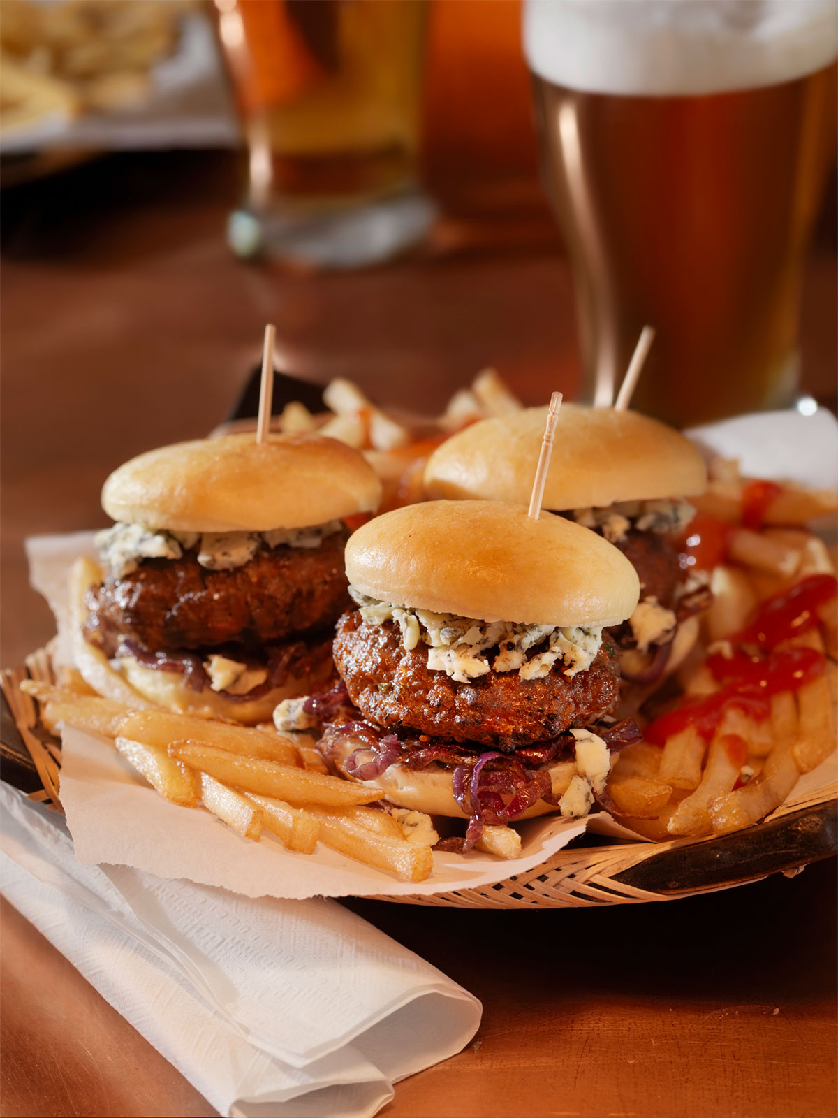 Beef Sliders with Allagash Curieux Caramelized Onions Bacon and Blue Cheese