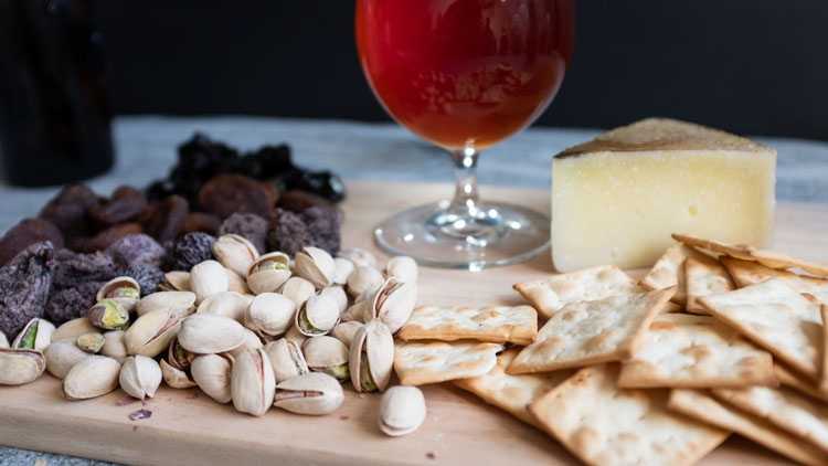 Fruit and nuts with a belgian beer 